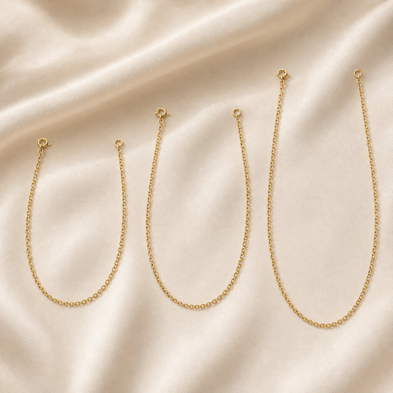 The Adornme Chain — 16 inch, 18 inch, and 20 inch lengths shown side by side