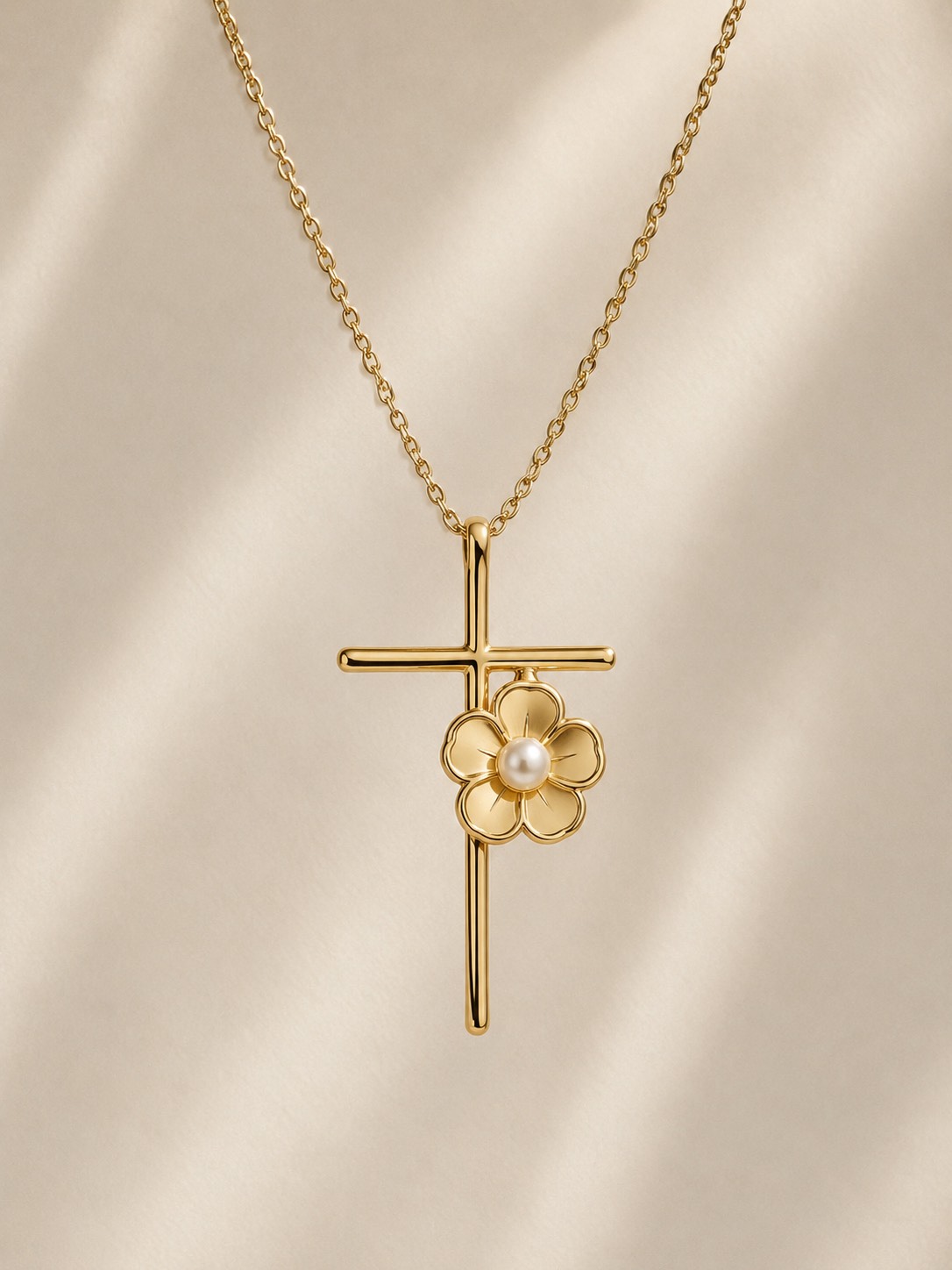 Flower Cross pendant in gold with pearl-centered flower